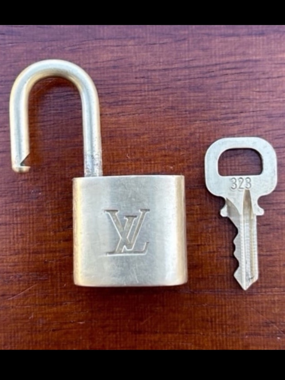 Louis Vuitton padlock with key #323